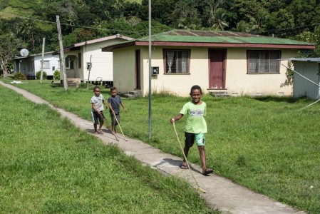 boys playing "stick"