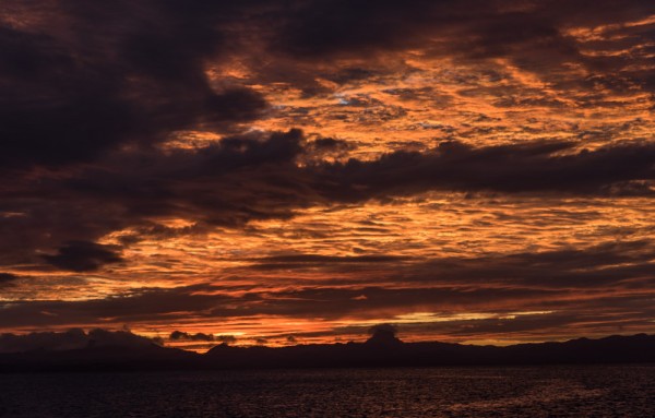 Sunset over Savusavu Bay from our cockpit