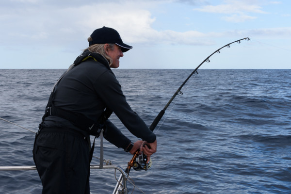 Monty reeling in a fish