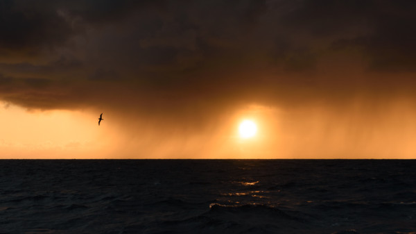 Sunset fighting through a squall