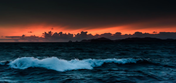 The entrance to the Bay of Islands with the sunrise to the east