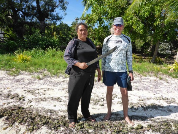 A villager hunting for coconuts we met along our walk. No messin' with 'er!