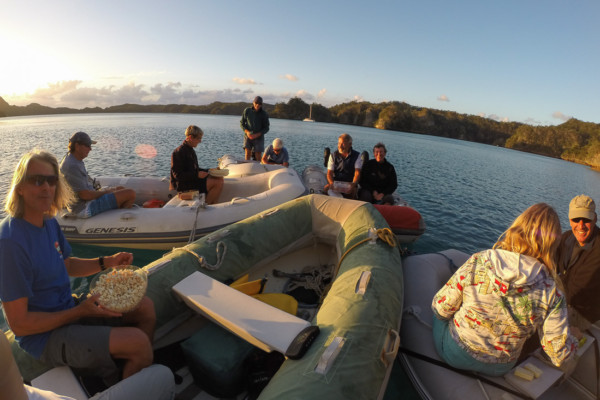 A dinghy rafting drift at sunset